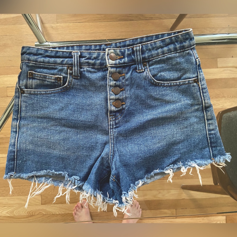 100% cotton button-fly cut offs.